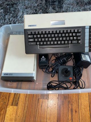 Atari 800xl Bundle W/1050 Computer Console And Joystick.