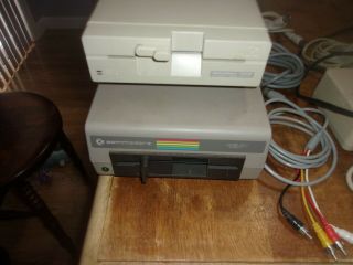 Commodore 128 Computer,  1 1541 Floppy Drive,  1 1541 II 2 Floppy drive,  Acces. 3