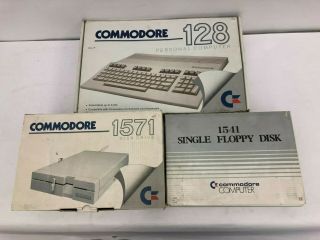 Commodore 128 Personal Computer W/ 1571 Disk Drive,  1541 Single Floppy Disk,  C128