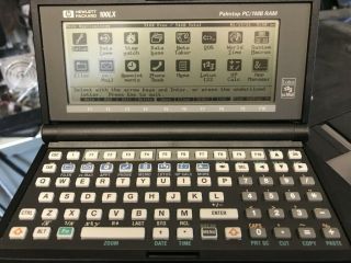 HP 100LX Palmtop Computer -,  ALL accessories,  hardly 2