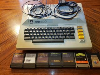 Atari 800 Computer 48k Ram With 7 Cartridges (5 Games,  Word Pro.  & Basic)