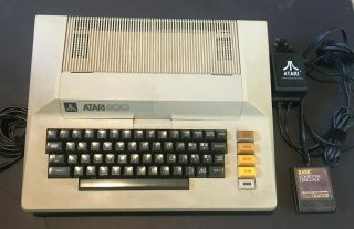 Atari 800 Home Computer With Basic Cartridge,  48k Ram,  And Well