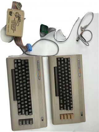 (2) Commodore 64 Computer Keyboards As - Is With Accessory Cords