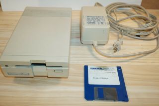 Commodore 1581 Floppy Disk Drive W/ Demo Disk,  Serial Cable