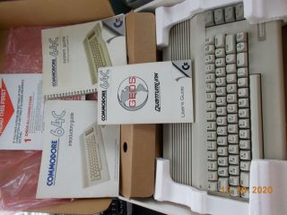 Commodore 64c Computer With Power Supply And Manuals,  Powers On