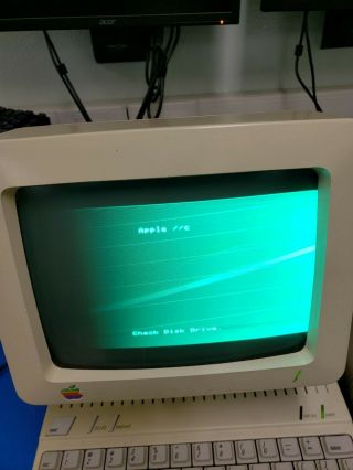 Apple IIc w/ monitor & (4) program diskettes 3