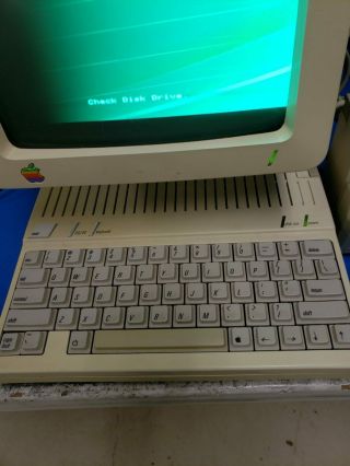 Apple IIc w/ monitor & (4) program diskettes 4