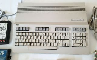 Commodore 128 Computer With Power supply,  games,  cards un - 3