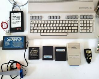 Commodore 128 Computer With Power supply,  games,  cards un - 5