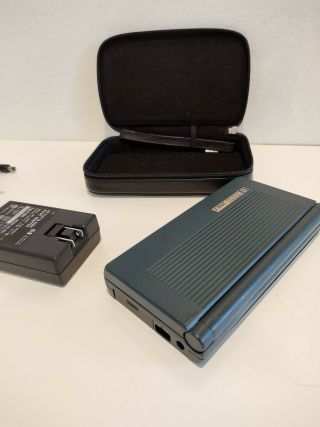 VG cond.  Hewlett Packard HP 200lx 2MB ram with correct power supply & soft case 3