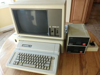 Apple IIe 2e Early Build,  Apple III monitor,  dual disk drives,  manuals,  software 3