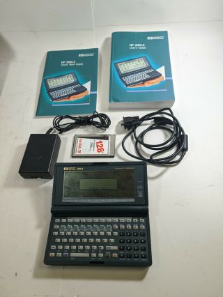 Hp 200lx 2mb Dos Pda W/ Manuals,  Data Cable,  128mb Pc Card Cond.