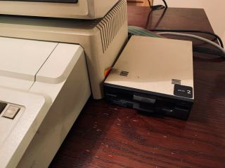 Apple IIe (2e) Computer (2S2064),  Monitor III (A3M0039),  Stand,  2 Drives 5
