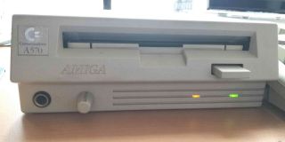 Commodore CD A570 unit in perfect order,  2 CDTV discs 4
