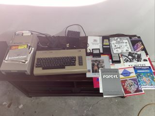 Commodore 64 Personal Computer Keyboard Power Supply Floppy Disk Drive Books