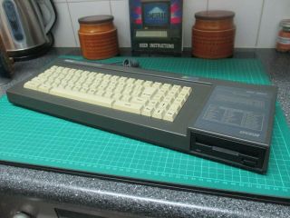 Boxed Amstrad CPC6128 computer (serviced,  belt) games,  mouse,  joystick,  tape 3