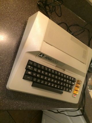 ATARI 800 Home Computer with GAMES,  and 4