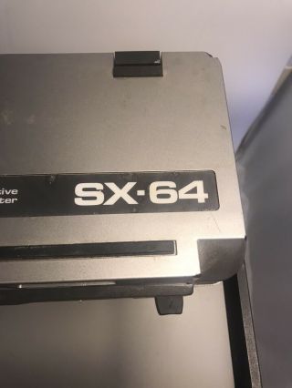 Vintage Commodore SX - 64 portable computer powers on 4