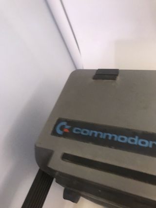 Vintage Commodore SX - 64 portable computer powers on 5