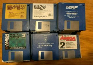 Amiga 1200 box with 90,  disks 3