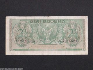 INDONESIA 2.  1/2 2.  5 RUPIAH P - 73 1954 ROTINESMAN MONEY BILL DUTCH COLONY BANKNOTE 2
