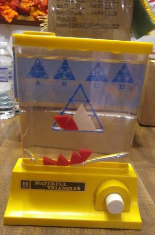 1976 Tomy Waterful Triangles Yellow Plastic Water Toy