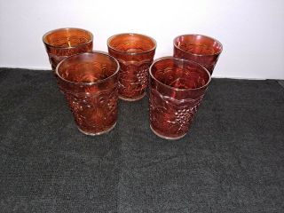 4 Marigold Carnival Glass Grapes and Vine Tumblers; 1.  Total Five (5) 2