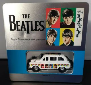 The Beatles Single Sleeve T Shirt And Die Cast Car Collectors Set.