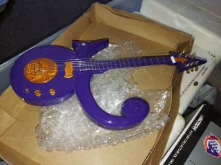 Prince Miniature Guitar.  Purple Rain Collectable