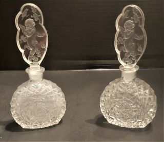 2 Matching Cut Crystal Perfume Bottles " Made In Czechoslovakia " With Putti Motif