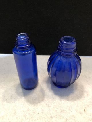 Two Small Cobalt Blue Bottles With (m) On Bottom & Japan On Other