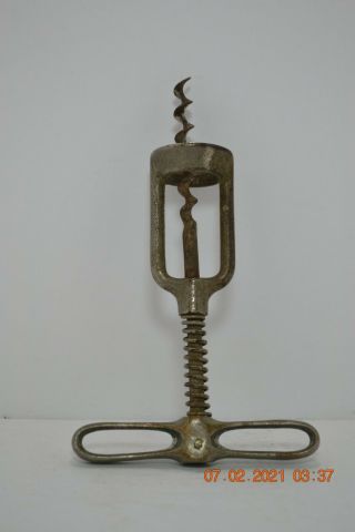 Antique Cast Iron Cork Screw With Brass Bowtie Handle