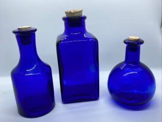 Three (3) Vintage Cobalt Blue Glass Bottles With Cork Stoppers