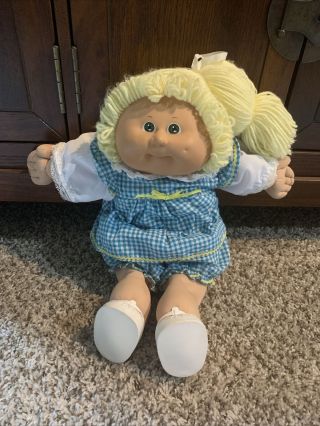 Vintage Cabbage Patch Doll.  Blonde Hair,  Sparkling Blue Eyes.  One Dimple