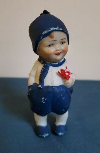 Vintage/antique German All Bisque Boy Nodder Doll Miniature 3 " Holding Flower
