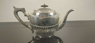 A Victorian Silver Plated Tea Pot With Engraved Patterns.  Late 1800.  S.  Ornate.
