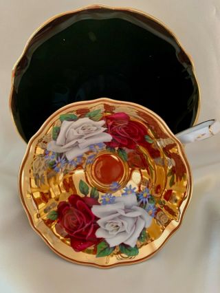 Queen Anne Floating Roses On Heavy Gold Tea Cup And Saucer