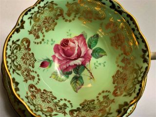 Paragon Floating Cabbage Rose Heavy Gold Gilt Light Green Cup & Saucer