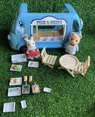 Sylvanian Families Fish And Chip Van And Two Figures.  Complete And Boxed.