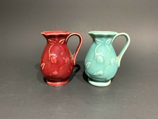 (pair) Vtg.  Shawnee Pottery Miniature Burgundy & Turquoise Embossed Bud Pitchers
