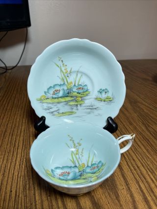 Paragon Blues And Greens Water Lily Cup & Saucer,  Queen Mary Double Warrant