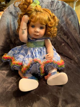 (562) 738/850 Marie Osmond Chasing Rainbows Porcelain Doll