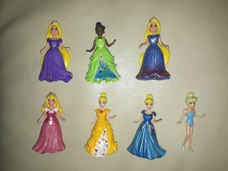 7 Disney Princess Magiclip Dolls,  6 Dresses