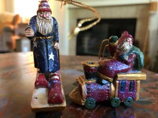 2 Santa Christmas tree ornaments:1 - Santa on train 2.  5 