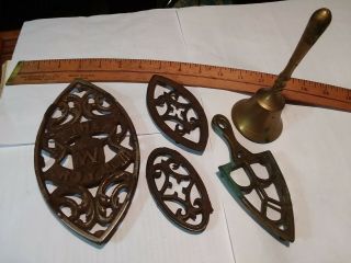 4 Old Sad Iron Trivets,  Including " The W Royal ",  Cast Iron & Brass;,  Brass Bell