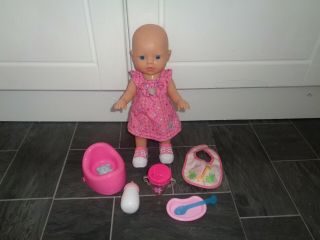 Baby Born Interactive Doll Bundle - Walking Doll,  Sounds - Bottle,  Cup,  Bib,  Potty Etc
