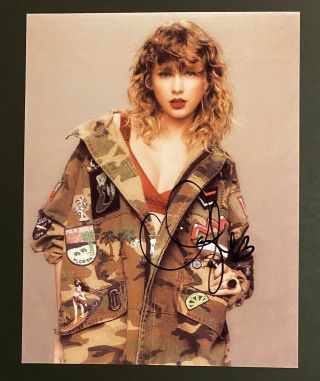 Taylor Swift Signed Autographed 8.  5x11 Photo