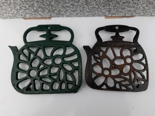 2 X Cast Iron Trivets In The Shape Of A Teapot Green/black Coloured