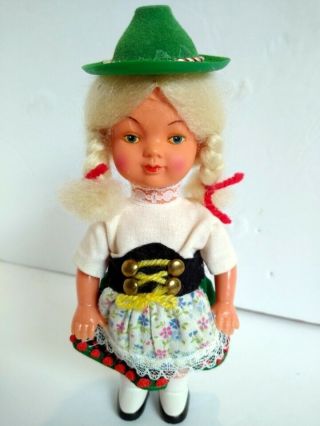 Vintage Swiss German boy and girl miniature dolls.  Plastic 7 