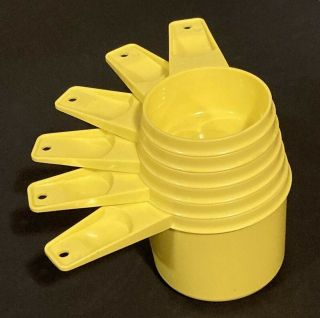 Vintage Tupperware Yellow 6 Piece Measuring Cup Set